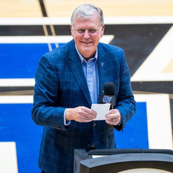 President Emeritus Thomas J. Haas speaks during ceremony that named the Fieldhouse Arena basketball court in his honor.