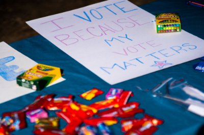 A sign on a table that reads &amp;amp&#x3b;quot&amp;&#x23;x3b&#x3b;I vote because my vote matters&amp;amp&#x3b;quot&amp;&#x23;x3b&#x3b;