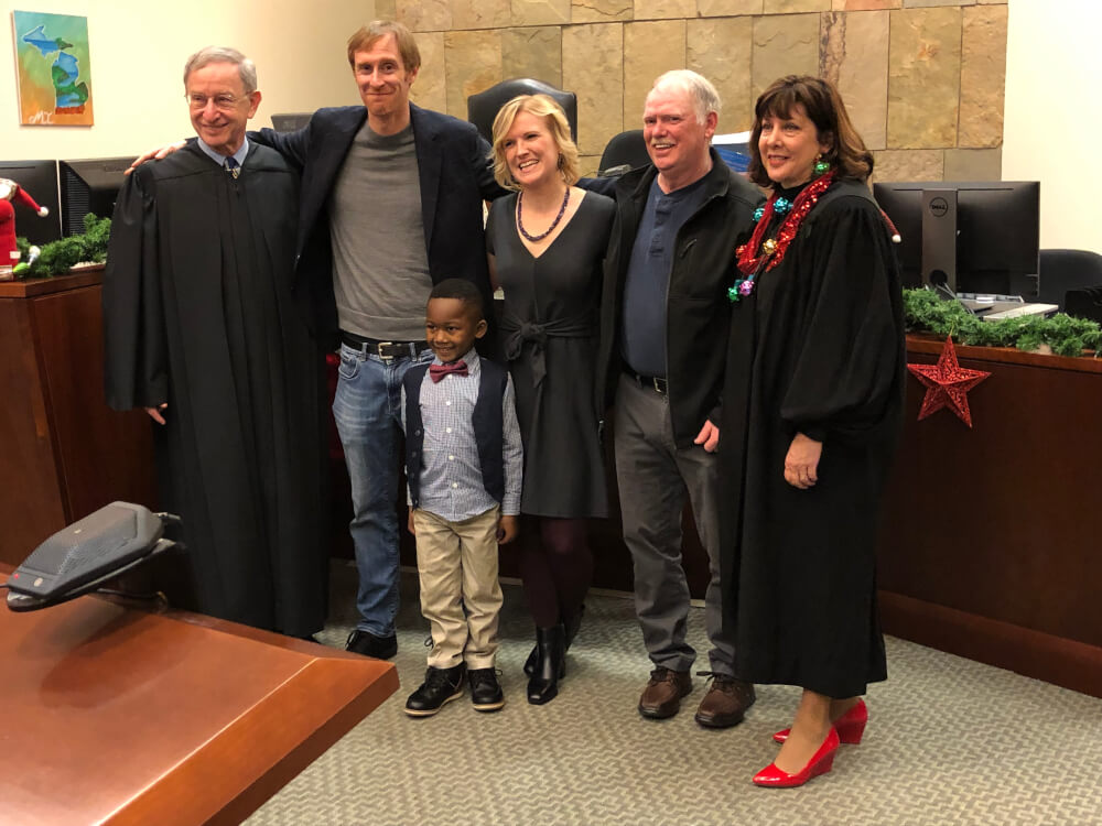 From left, Michigan Supreme Court Justice Stephen J. Markman, David Eaton, Michael, Andrea Melvin, George (maternal Grandfather) and Kent County 17th Circuit Court Judge Patricia Gardner.