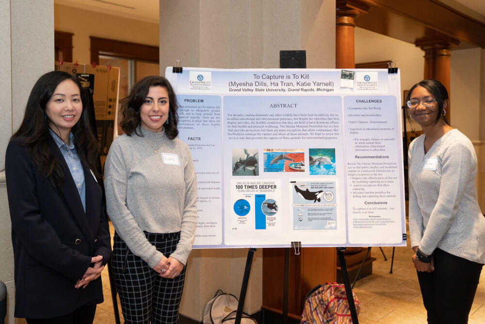  Ha Tran, Myesha Dills and Katie Yarnell worked together on research about protecting marine life. 