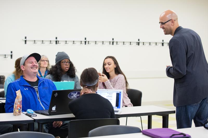 Louis Moore talks with students in a Black Lives Matter course.