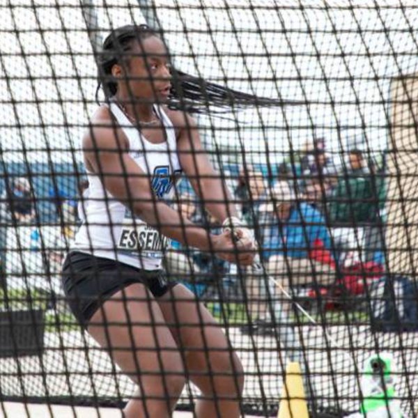 Judith Essemiah competes in the hammer throw
