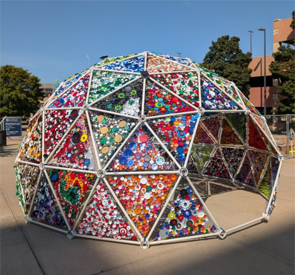 Adrienne Outlaw&#8217;s &#8220;Grand Dome&#8221; a color plastic dome filled with triangles of bottle caps