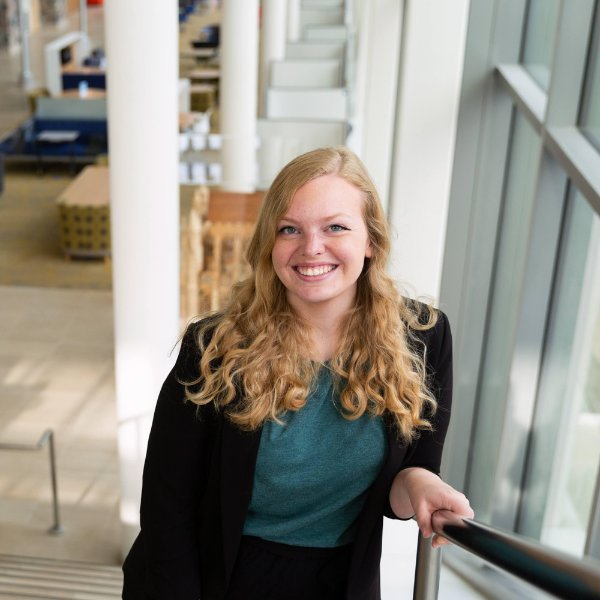 A portrait of Caroline Murray in GVSU's Mary Idema Pew Library on the Allendale Campus