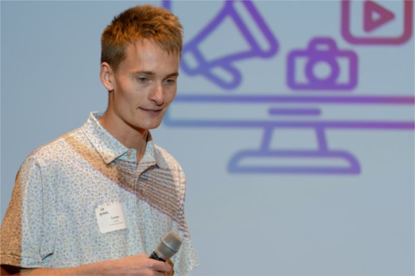 Tucker Carlile answers a question from a judge during the 77 Idea Quest pitch competition on March 27.