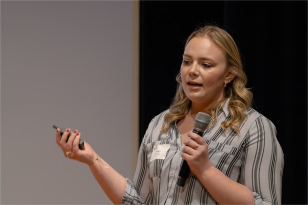 Ashlyn McLaughlin answers a question from one of the judges during the 77 Idea Quest pitch competition on March 27. 