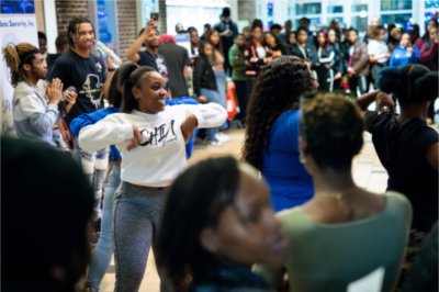 A group of students dances at Grand Valley's "The Blackout: Black Student Organization Showcase".