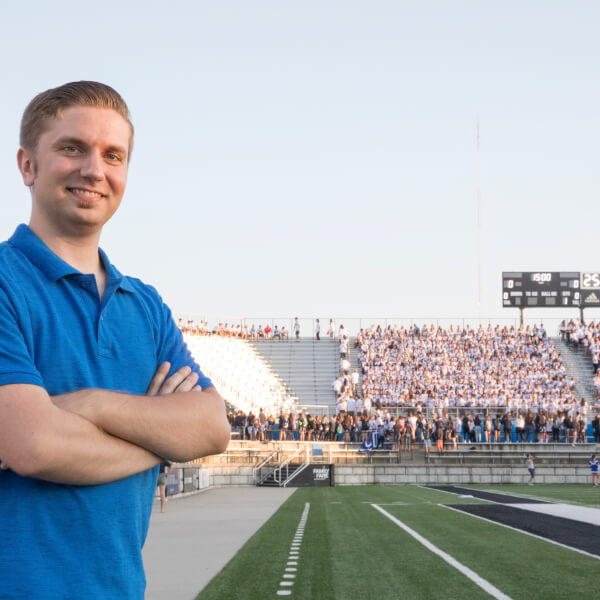 Joel Paauwe, '15, pictured in front of the Laker Marching Band during Fan Fest August 23, an annual event that introduces new Lakers to GVSU Athletics and game day cheers and traditions. 