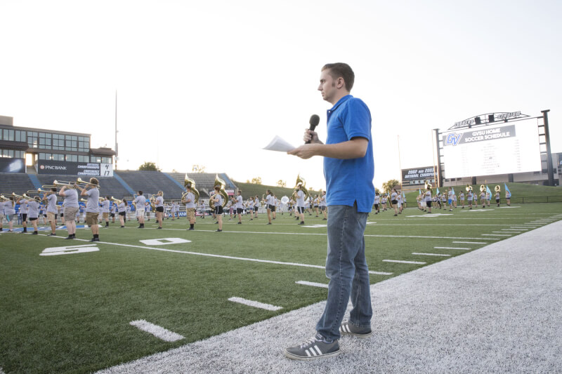 Joel Paauwe, '15, announcing for the Laker Marching Band during Fan Fest August 23, an annual event that introduces new Lakers to GVSU Athletics and game day traditions. 