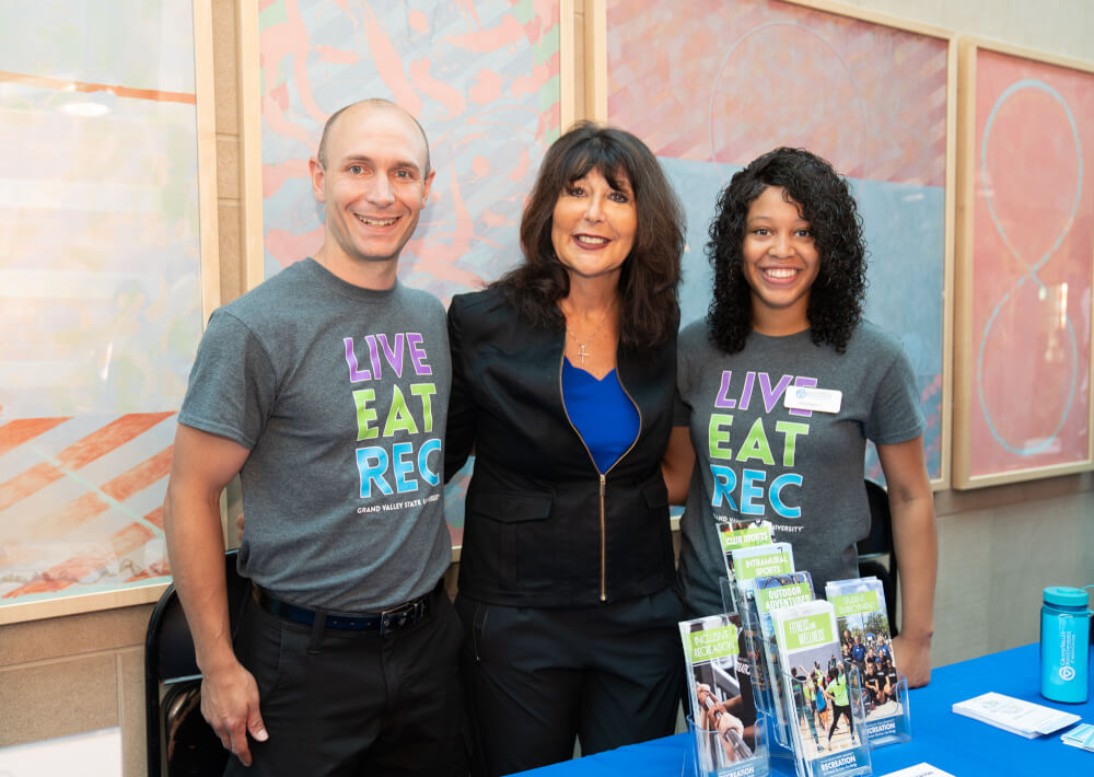 President Mantella takes a photo with staff from the Rec Center.