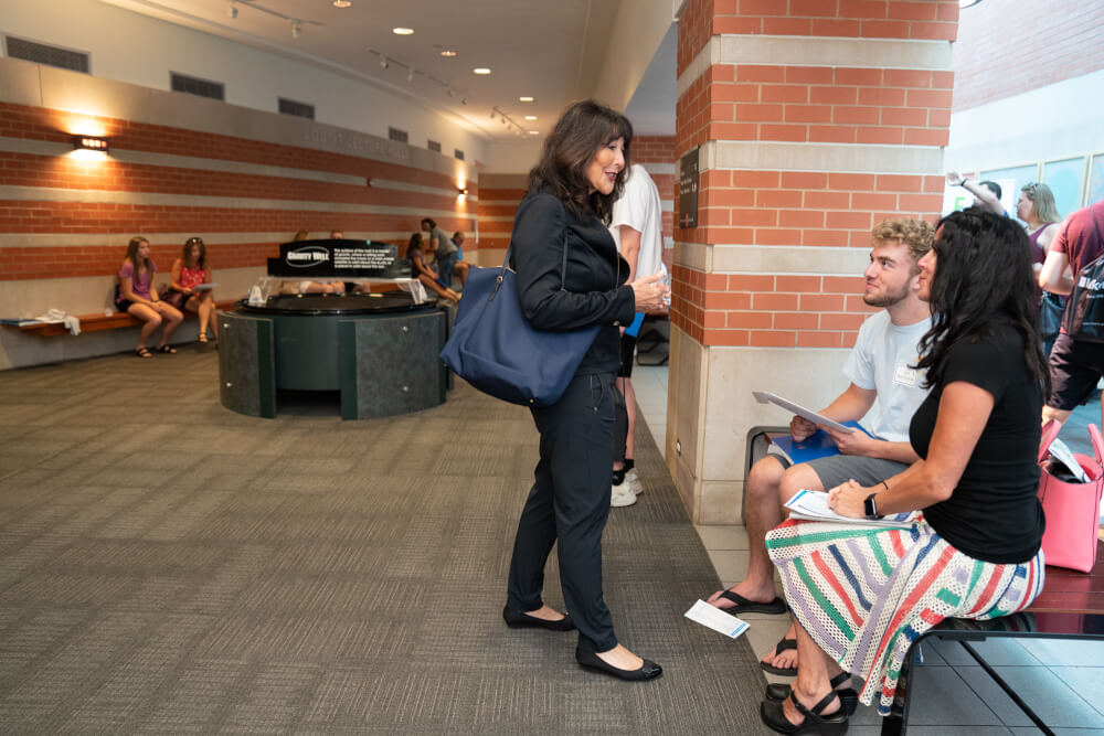 President Mantella greets students and parents at orientation on July 15.