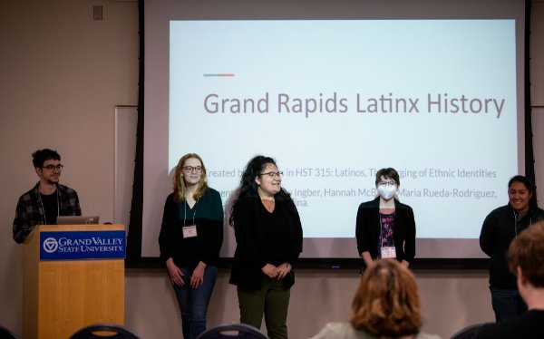 Students present their group presentation during Student Scholars Day