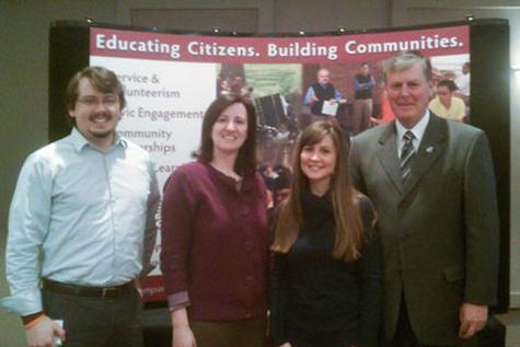 Pictured are, from left, Jeff Mutch, Julia Mason, Valerie Jones and President Thomas J. Haas at the MCC Institute in East Lansing.