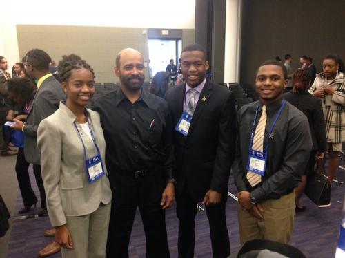From left, Tamarind Forbes, NSBE co-founder Frederick Cooper, Atone Joryman and KeyonTay Harris at the national convention in Boston.