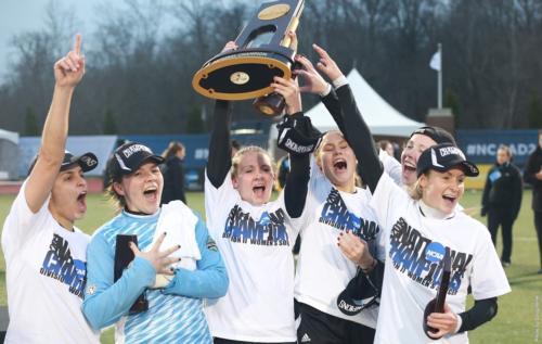 Soccer players celebrate their national title.