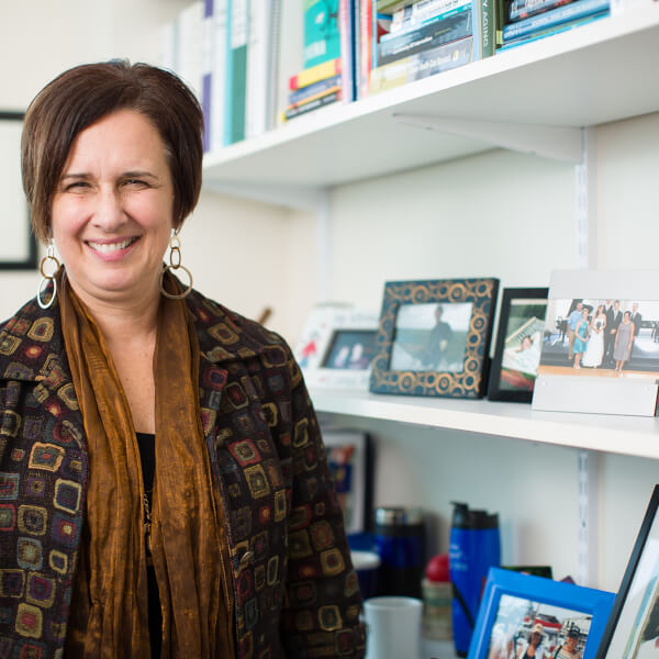 Sandra Spoelstra pictured in her office, standing
