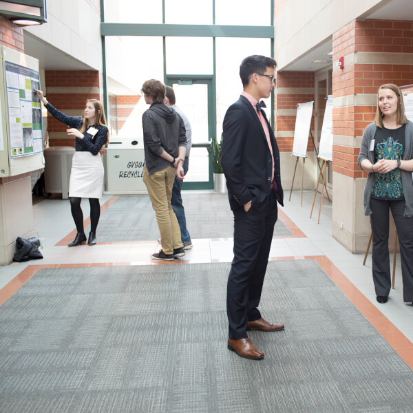 students at poster presentation