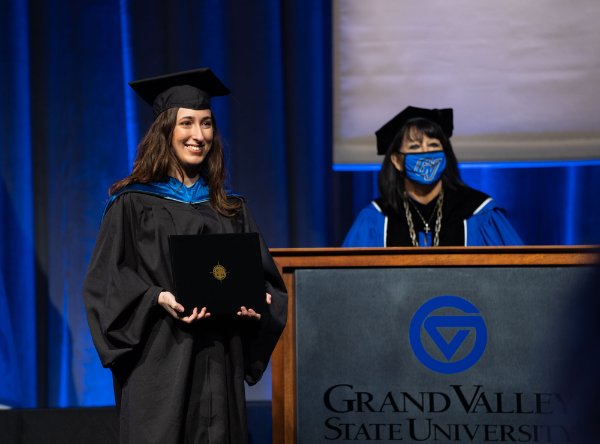 A proud graduate with President Mantella