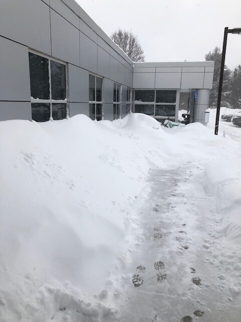 Heavy snow on the Services Building on the Allendale Campus.