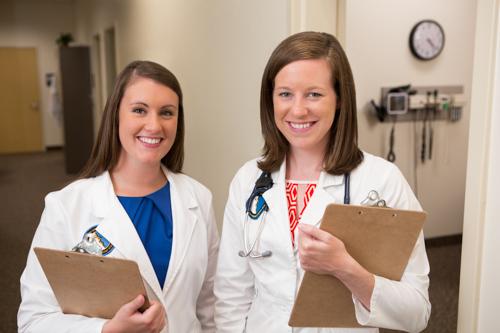 Physician assistant studies majors Jamie Phillipich, left, and Margie Webb surveyed 1,000 first-year students to assess the influence media has on the perception of HPV and vaccine compliance.