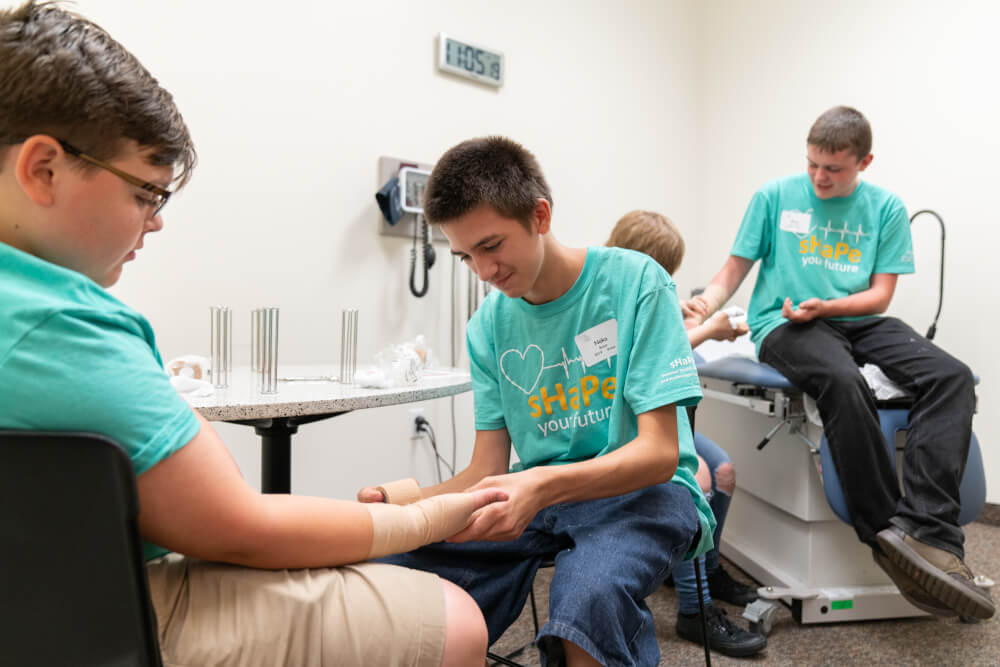About 80 middle school students explored health careers during a summer camp at Grand Valley State University.