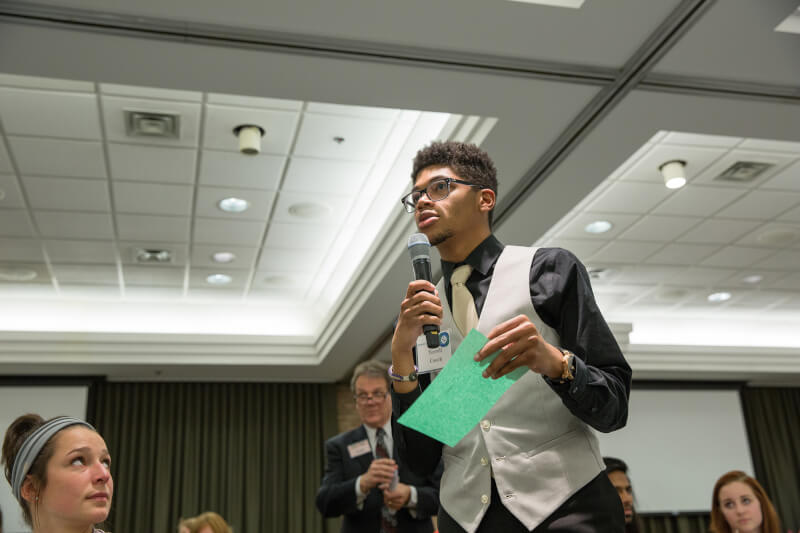 In the background is Alan Headbloom, who served as co-moderator.