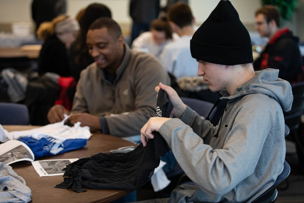 people making crafts at table