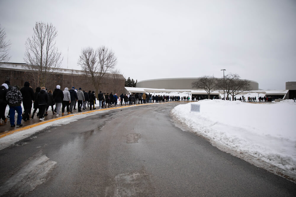people marching into the Fieldhouse