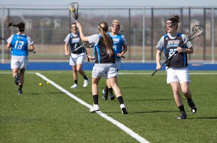 Laker lacrosse players practice prior to Friday's home opener.