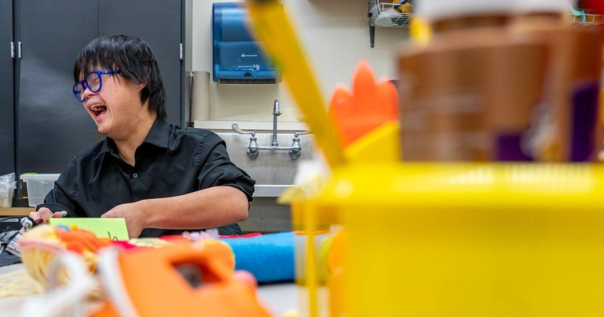 Art Buddies: Lakers work with special education students to create playful art pieces