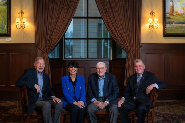 From left are Mark Murray, President Mantella, Don Lubbers and Thomas Haas, all seated in chairs in the regency room of the DeVos Center.