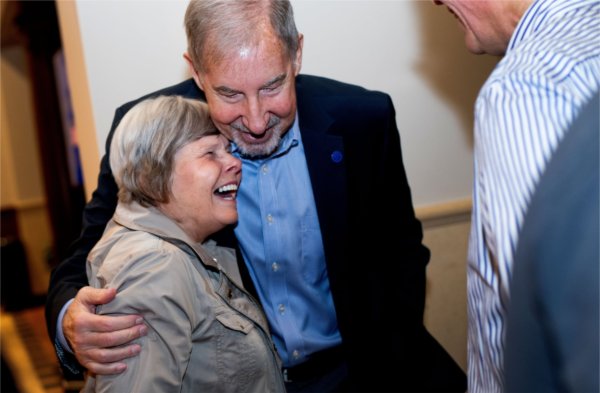Claudia Bajema, retired director of graduate programs for the Seidman College of Business, hugs former President Mark A. Murray.