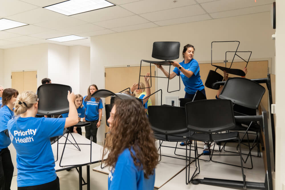 Students practice close-lock-barricade procedure.