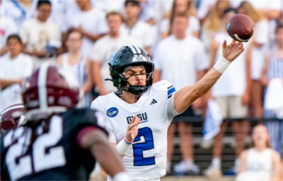 Grand Valley quarterback Andrew Schuster throws the football down the field to a teammate. 