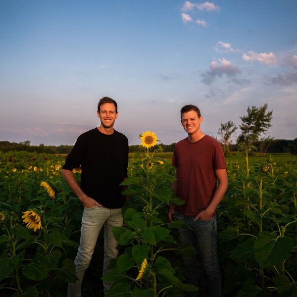Ross and Jordan Bremer stand in their 'U-pick' sunflower field