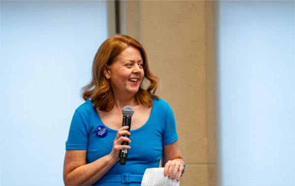 Dawne Bell, executive director of Economic Development and Public-Private Partnerships, introduces Paul Isely to open the President's Forum.