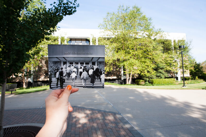 students walking into Lake Superior Hall
