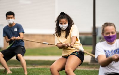 International students participate in a &#x27;tug of peace&#x27; game during orientation.