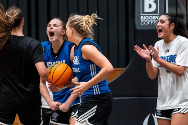 Page VanStee yells in excitement after making a basket during the women's Basketball practice.