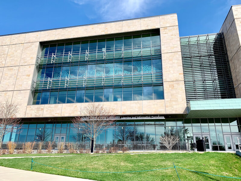 About 1,000 "waves of wishes" are displayed on the library windows, wishing students good luck during finals week.