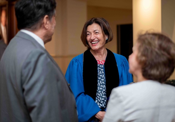 Fatma Mili, provost and executive vice president for Academic Affairs, congratulates Christian Trefftz, professor of computing, left, after he received the Glenn A. Niemeyer Award during the Faculty Awards Convocation