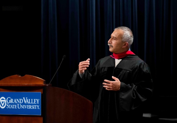 Bopi Biddanda, professor of Robert B. Annis Water Resources Institute, gives the convocation address during the Faculty Awards Convocation.