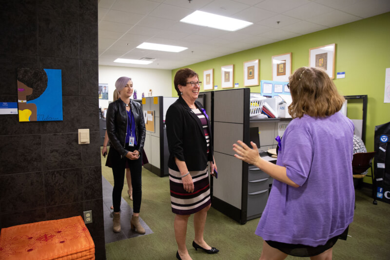 A photo Sue Snyder visiting the Center for Women and Gender Equity.