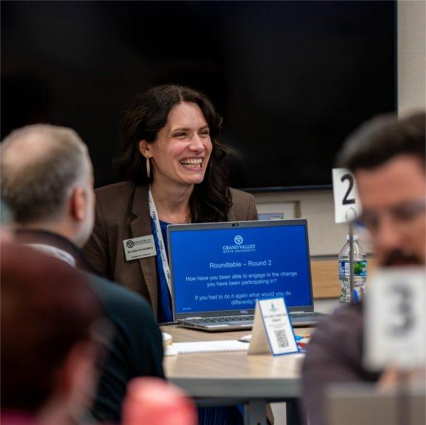 A roundtable conversation takes place during the 2025 Technology Summit at GVSU.