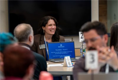 A roundtable conversation takes place during the 2025 Technology Summit at GVSU.