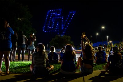 Students watch a drone show as part of the Laker Kickoff on the Kirkhof Lawn on August 22.