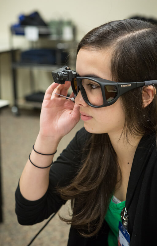 woman wearing eye-tracking glasses