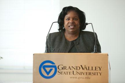 Harriet Singleton addresses the audience after receiving the Maxine Swanson Award from the Women�s Commission in March. She will retire this month after 35 years of service.