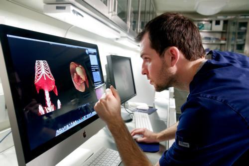 Grand Valley alumnus Anderson Peck helped form the medical imaging research lab at VAI three years ago; he now works there as a researcher.