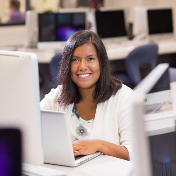 woman sitting in computer lab